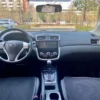 Nissan Tiida алдыңғы қатарда