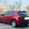 Nissan Tiida trasera izquierda